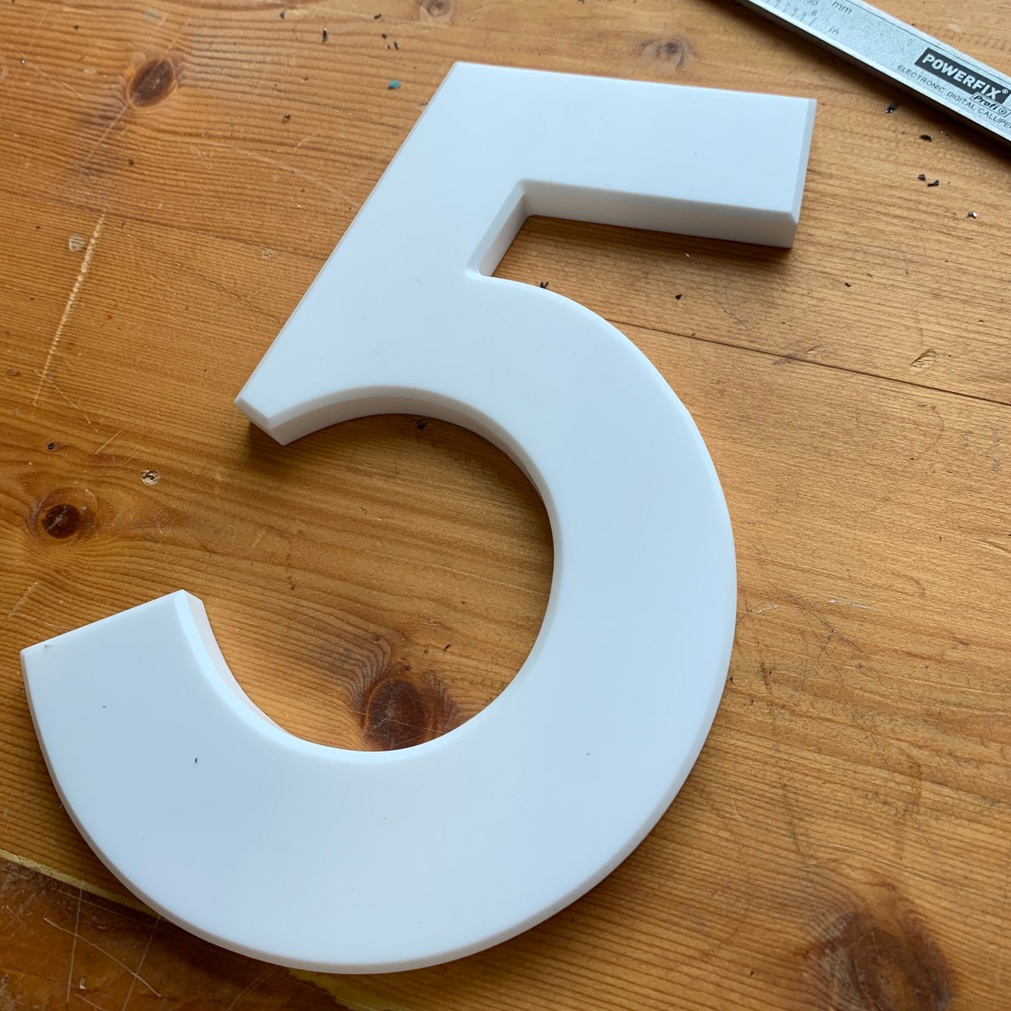 white corian stick on number 5